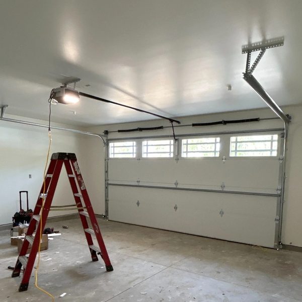 New garage door installation in progress — Houston TX